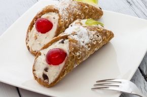 The exact origin of cannoli isn't entirely clear. Fortunately, that has no bearing on deliciousness. 