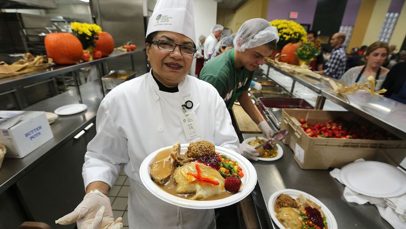 Narie Alli shows off a Thanksgiving meal