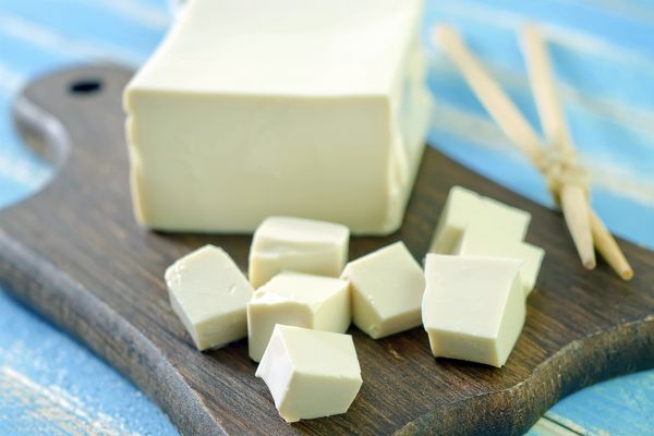 A block of soy cut up into chunks.