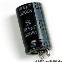 how does a capacitor trip device work