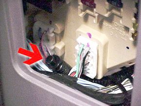 A valet switch is a manual shut-off that temporarily disables the alarm system (so you can let the valet park your car, for example). The valet switch is hidden in an out-of-the-way spot in the car. The switch pictured here is mounted under the car's fuse access panel.