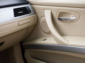 Speakers mounted in the car doors can create vibrations and harshness. Adding sound deadening material like Dynamat may be a good solution.