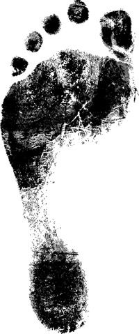 A footprint on paper in black ink