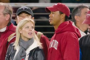Tiger Woods and his wife, Elin Nordegren, at a sporting event on Nov. 21, 2009 -- just days before the cheating scandal broke