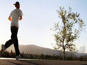 Woman jogging in park. 