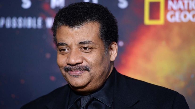 尼尔·德格拉斯·泰森（Neil Degrasse Tyson）。“border=