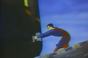 Even super-strong Superman has to use all his strength to counteract the forces pulling the train downhill.