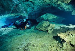 Cave divers need to move through the water very carefully if they want to avoid "the bends."”border=