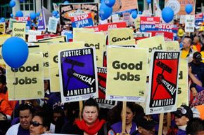 Workers march in support of rights for union members in Los Angeles on March 26, 2011. See more protesting pictures.
