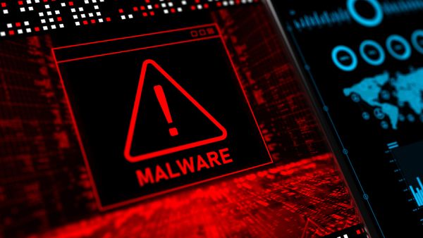 Cell Phone with Virus Displaying Red Malware Detected Warning