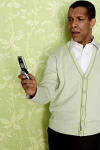 man holding cell phone