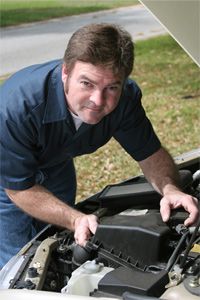 guy working on car