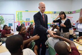 Florida Governor Rick Scott visits the Florida International Academy charter school in Opa Locka on Jan. 6, 2011.