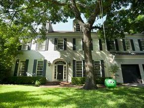 large home with trees