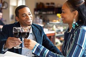 black couple drinking wine