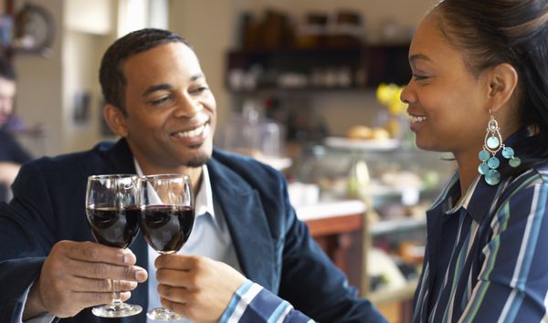 black couple drinking wine