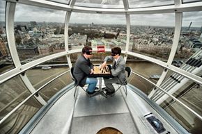 Chess grandmasters playing each other on the London Eye