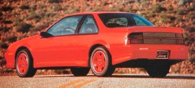 A red, 1993 Chevrolet Beretta.