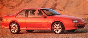 A red, 1994 Chevrolet Beretta.