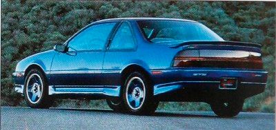 A black, 1992 Chevrolet Beretta.