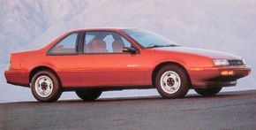 A red, 1991 Chevrolet Beretta.