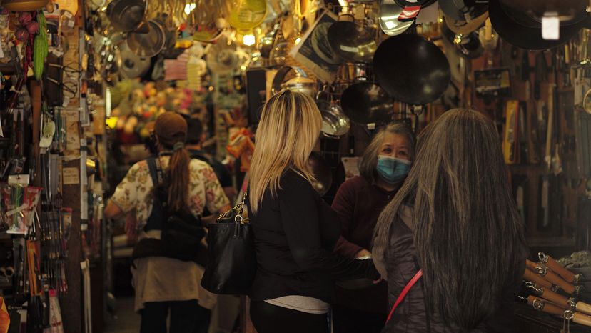 Tourists visit a shop in the San Francisco Chinatown