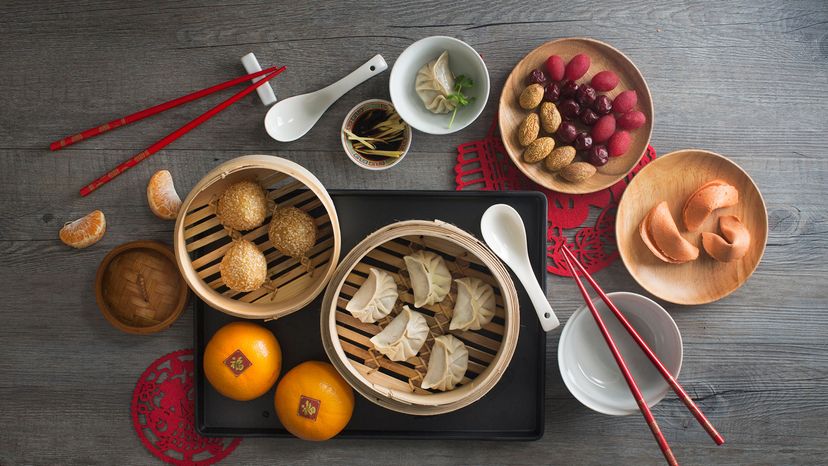 nuts, oranges, tangerines and Chinese dumplings