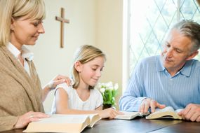 children being guided by adults
