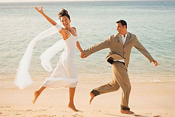 bride and groom on the beach