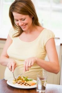 A pregnant woman should eat a healthy extra 300 calories a day for the baby. See more pregnancy pictures.