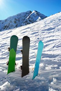 Three snowboards