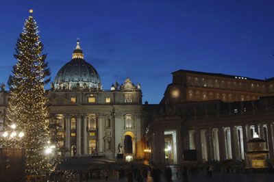 The Christmas tree in St Peter's Square stands illuminated during the tree lighting ceremony on Dec. 20, 2005 in Vatican City. 