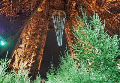 An upside-down Christmas tree hangs from the Eiffel Tower in Paris in December 2006.