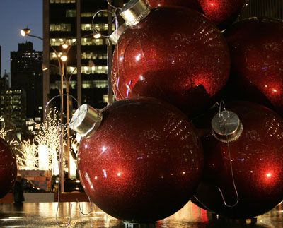 Giant Christmas tree ornaments sit in the plaza of a high-rise on 6th Avenue in New York on Dec. 6, 2006.