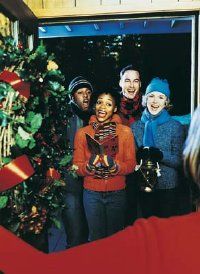 Carolers singing on doorstep