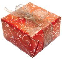 red wrapped present with transparent gold bow