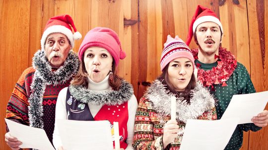 Why Do Christmas Carolers Walk Around the Neighborhood Singing?