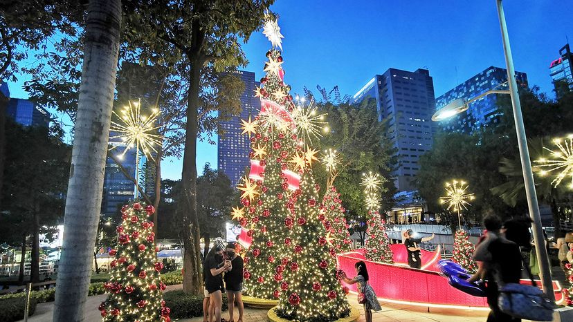 People look at Christmas decorations at Bonifacio Global City