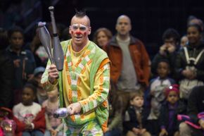 Jugglers can perform with a many different objects, including bowling pins.