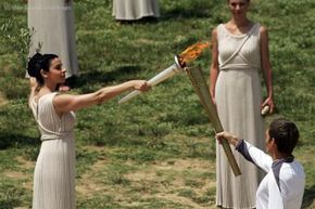 The lighting of the Olympic torch in 2012. Destination: London. See more Olympic pictures.