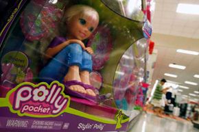 A Polly Pocket doll sits on a store shelf in Arlington, Va. in 2007. Mattel recalled millions of these due to reports of children ingesting the small, powerful magnets.