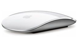 An Apple mouse for a MacBook computer.