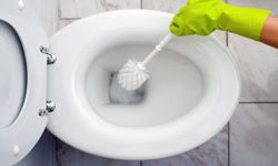 cleaning toilet