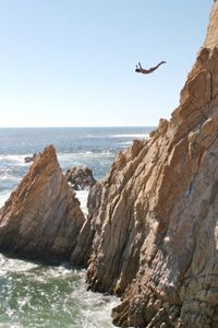 Exploring nature's outdoor cliffs.