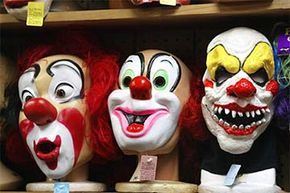 Clown masks, ranging from cheery to evil, are displayed at the Fantasy Costumes HDQ store in Chicago prior to Halloween.