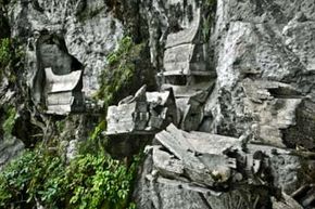 Several other cultures have honored or protected their dead (and the valuables they're laid to rest with) in hanging coffins. These coffins sit on platforms suspended from the face of a cliff near the Ke'te Kesu village in Sulawesi, Indonesia.