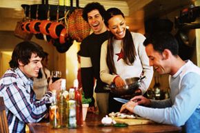 Friends cooking together.