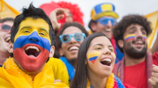 Cheerful men smiling in sporty happiness.