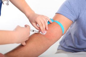 Getting a flu shot will help you avoid the most common influenza viruses brewing in any given year, but it can't keep you from catching a cold.