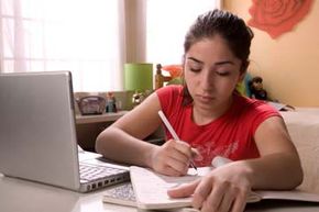 Female student studying at computer